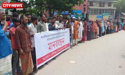 পঞ্চগড়ে সাংবাদিক সহ তিনজনের নামে মিথ্যা মামলা প্রত্যাহারের দাবিতে মানববন্ধন