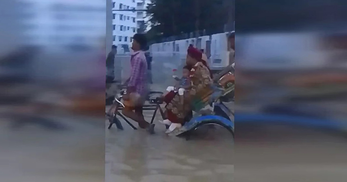 সিলেটে বন্যার পা‌নি মা‌ড়িয়ে রিকশায় বর-কনে যাওয়ার ভি‌ডিও ভাইরাল